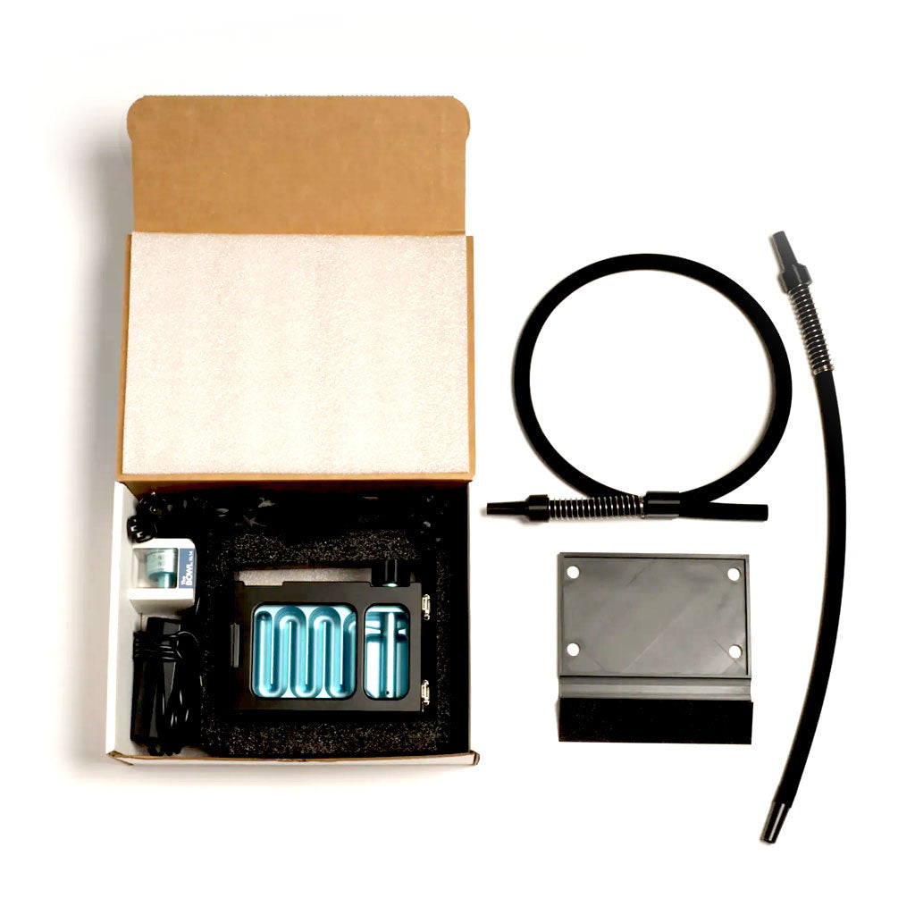 Unboxed The Box by Lidavel black dab rig chiller kit with hose, power cable and parts inside retail packaging from Honeybee Herb. 