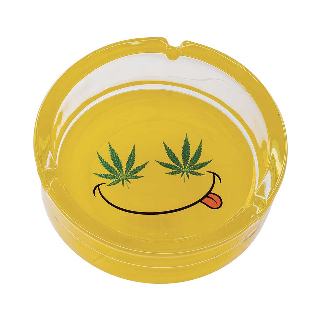 Yellow Smiley Leaf Glass Ashtray top view, durable glass with bold smiley leaf artwork, available online at Honeybee Herb