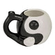Yin Yang Premium Roast and Toast pipe mug with glossy black and white body, built-in front bowl, curved pipe-style handle, and round chubby shape